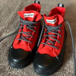 Hunter canvas high tops.